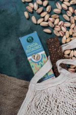 cereal-bar-on-a-table-with-raw-pistachios