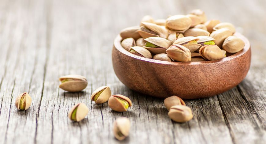 raw-pistachios-in-a-brown-bowl
